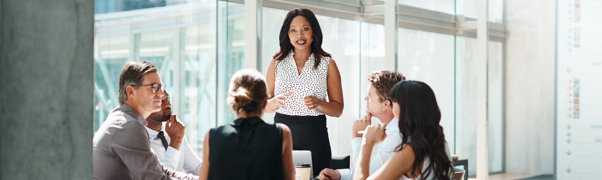 Woman talking to diversity in communications group